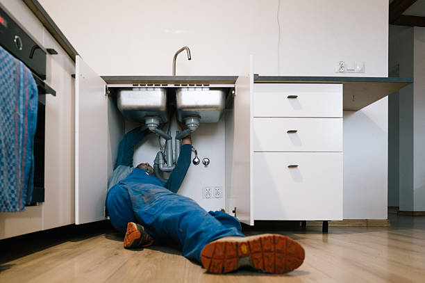 Professional Emergency Plumber technician working in Independence, VA